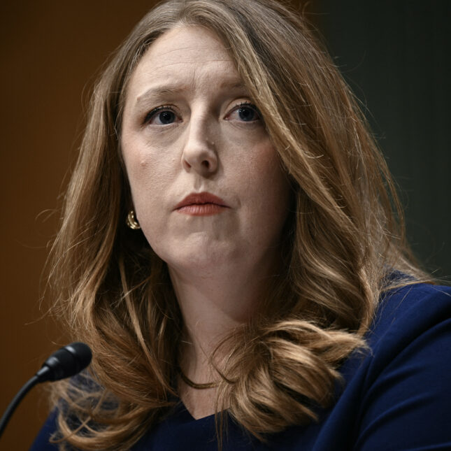 A file news photograph of Casey Means testifying during a senate committee hearing in Washington, Feb 2026